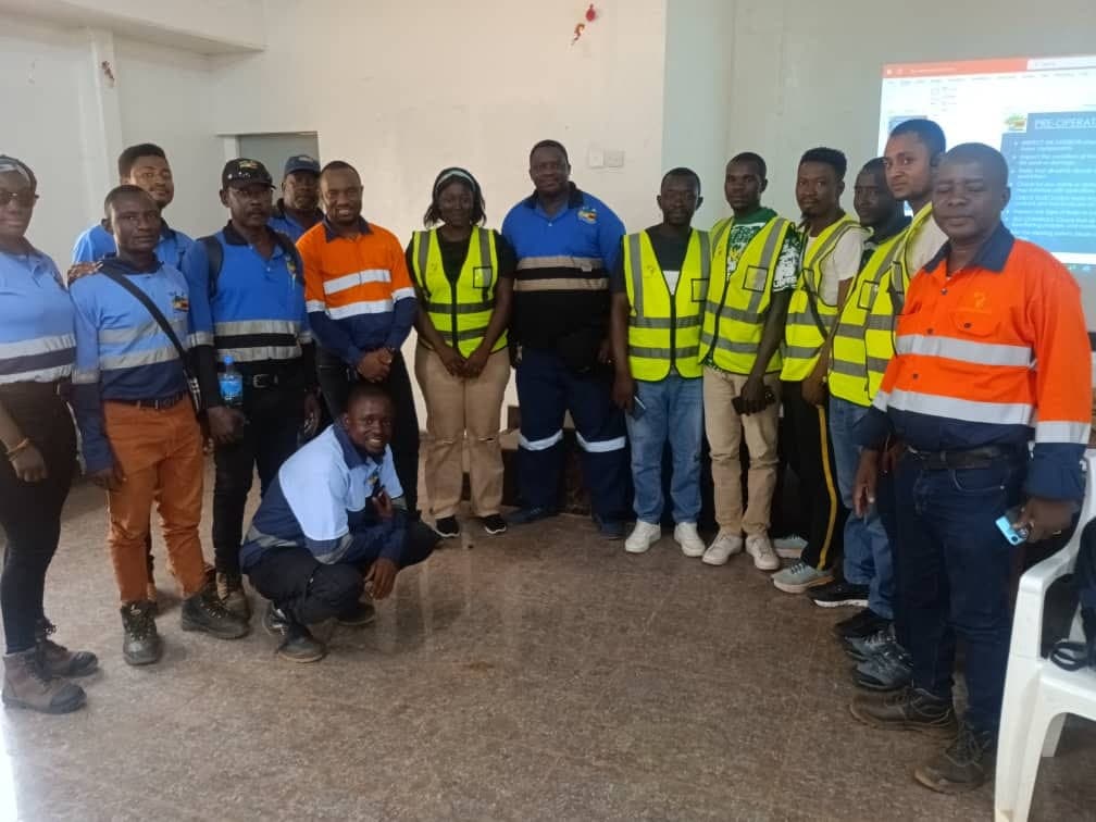 SierraZim leadership on site with heavy equipment